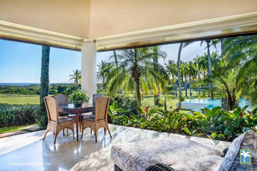 Garden view from the cozy patio, perfect for morning coffee or afternoon relaxation.