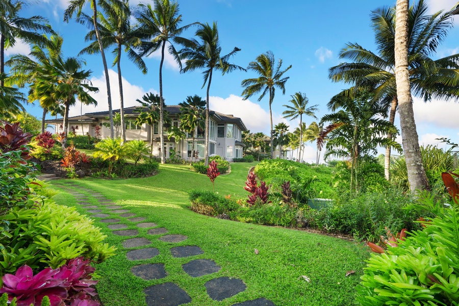 Step into a tropical paradise where lush greenery meets the azure sky.