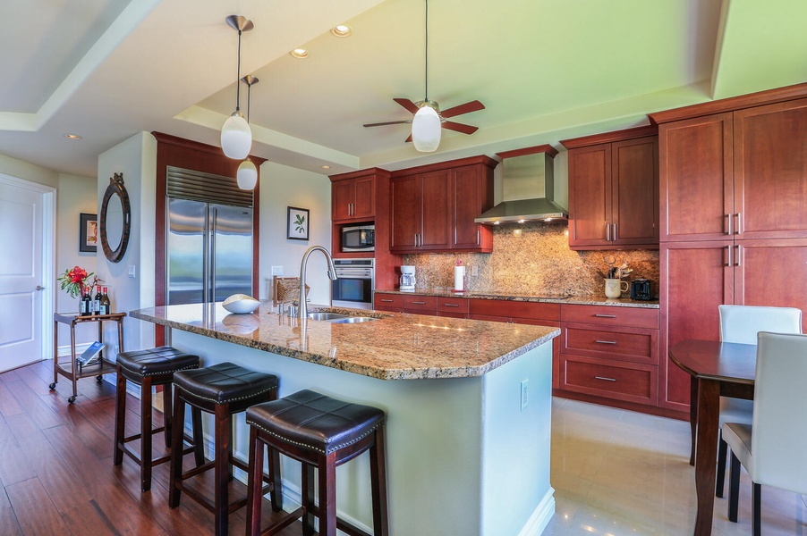 Kitchen island with three seats perfect for quick meals or entertainment.