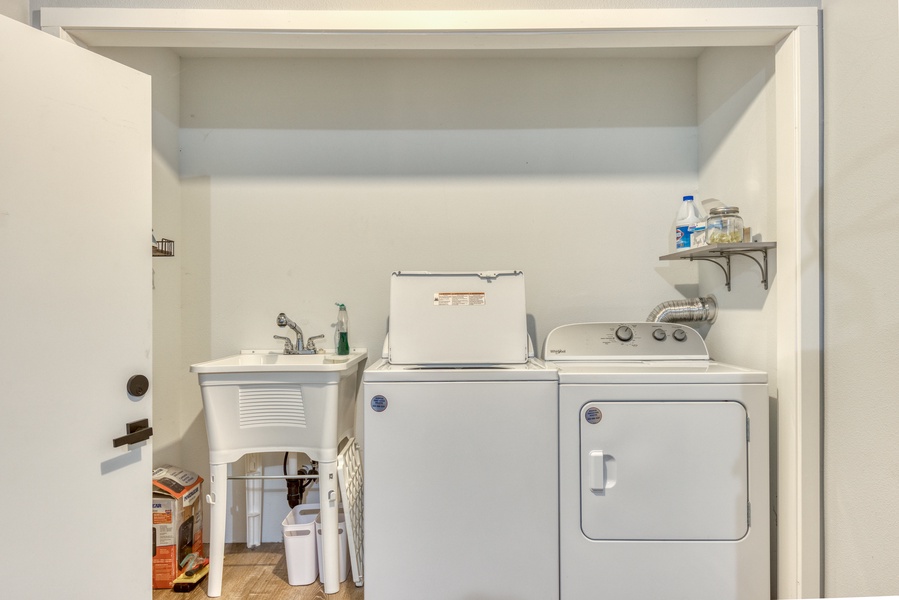 Full Laundry Room with washer and dryer.