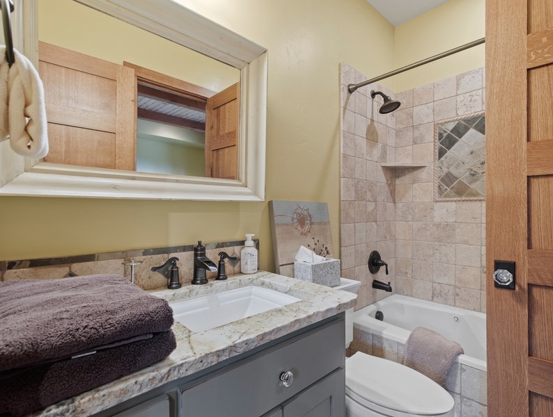 Elegant bathroom with a bath tub and shower