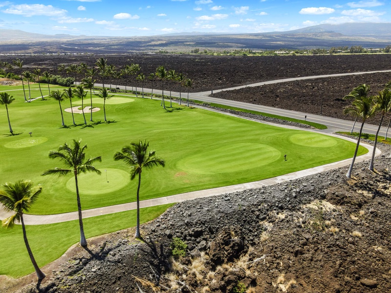 Panoramic views of Mauna Lani's championship golf course just steps away.