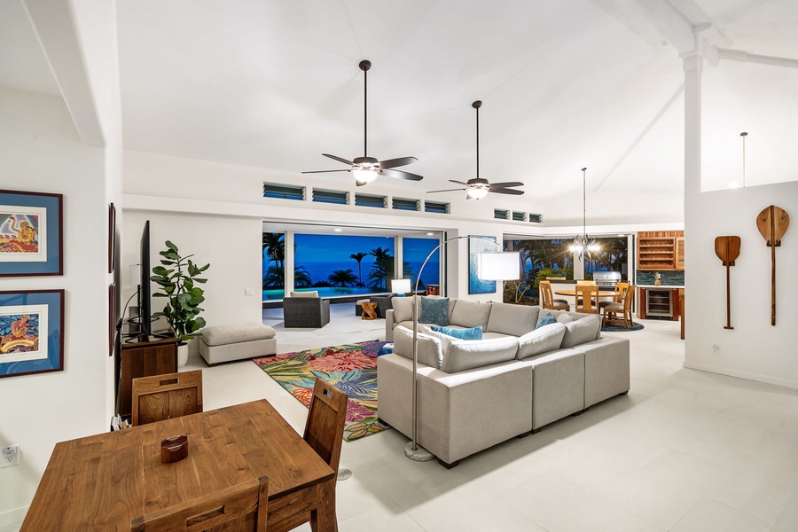 Indoor dining area flows seamlessly to the pool lanai, where resort-style ambiance meets everyday comfort in your private retreat