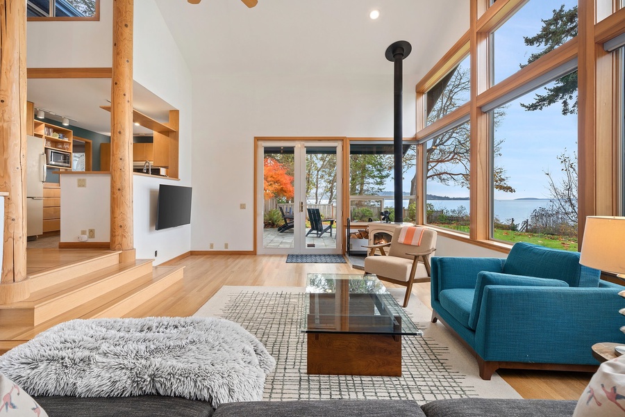 Tall and wide windows fill our living area with natural light, offering views that bring the outside in.