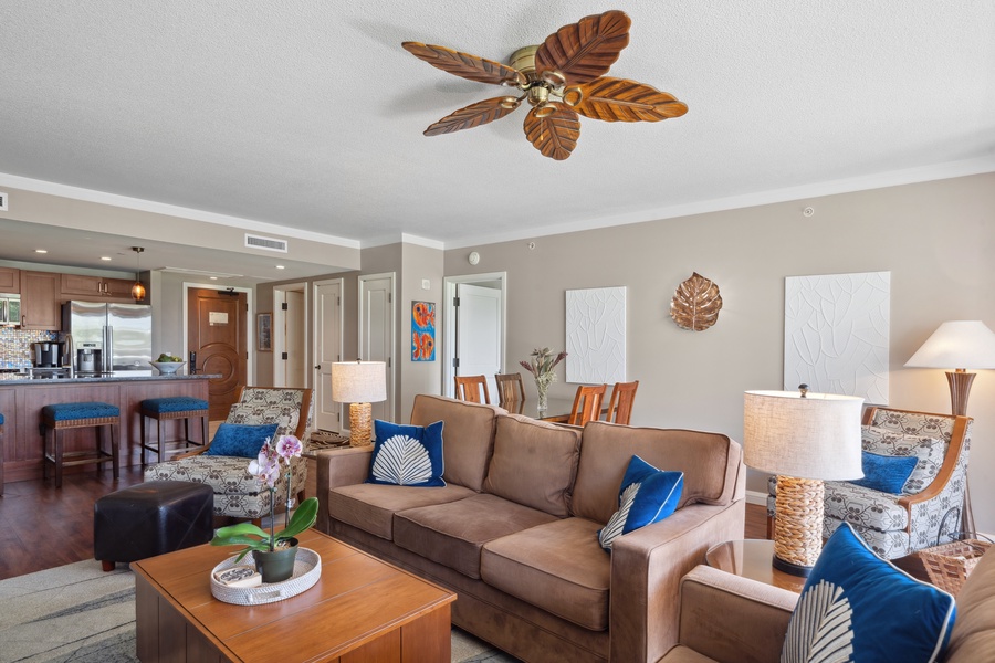 The inviting living room at Honua Kai - Konea 204 by Gather features updated island-style décor and plush comfort.