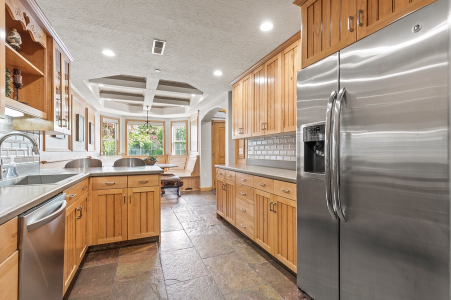 Step into the spacious kitchen with abundant natural light