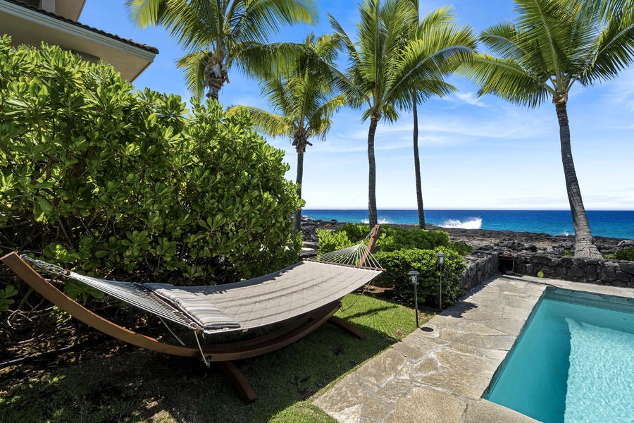 Sway gently in the hammock while soaking in endless ocean views.