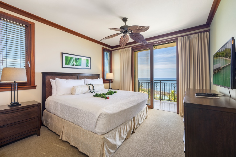 Wake up to stunning ocean views from your comfortable bed, where tropical breezes flow through your private lanai doors.