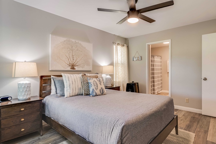 The Primary bedroom features a queen-sized bed.