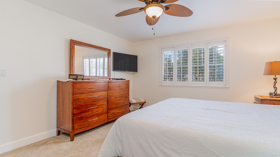 The spacious primary guest bedroom.