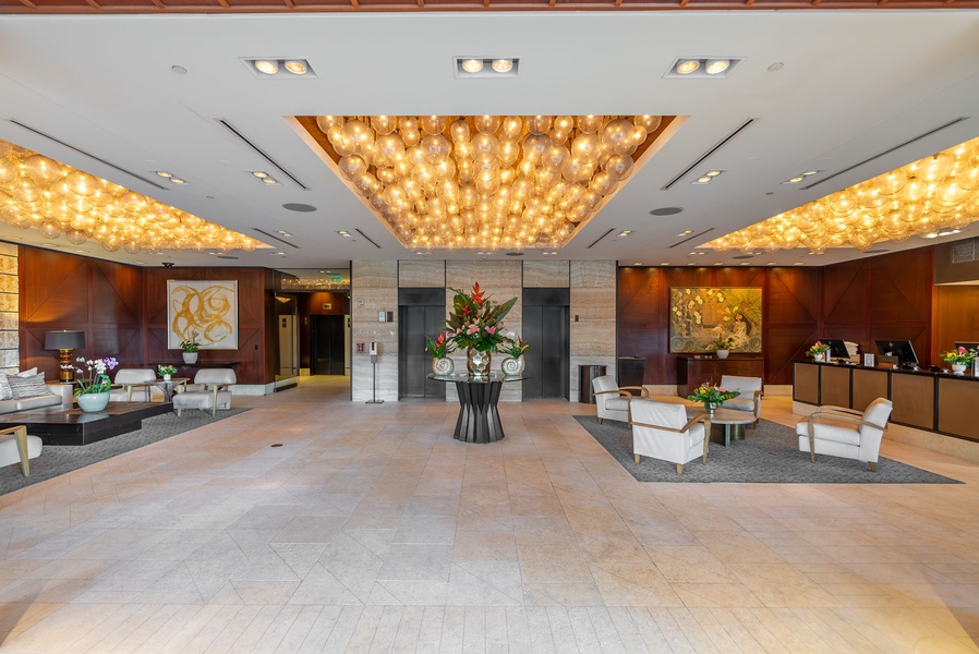 Entrance lobby with comfortable seating and sophisticated decor, setting the tone for a luxurious experience.