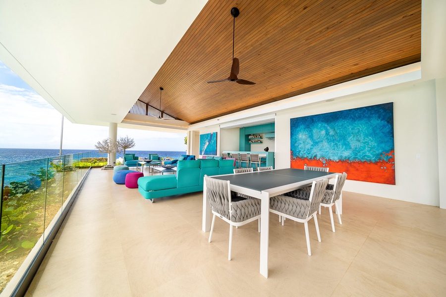 Dine in style in this spacious open-air dining area with breathtaking ocean views.