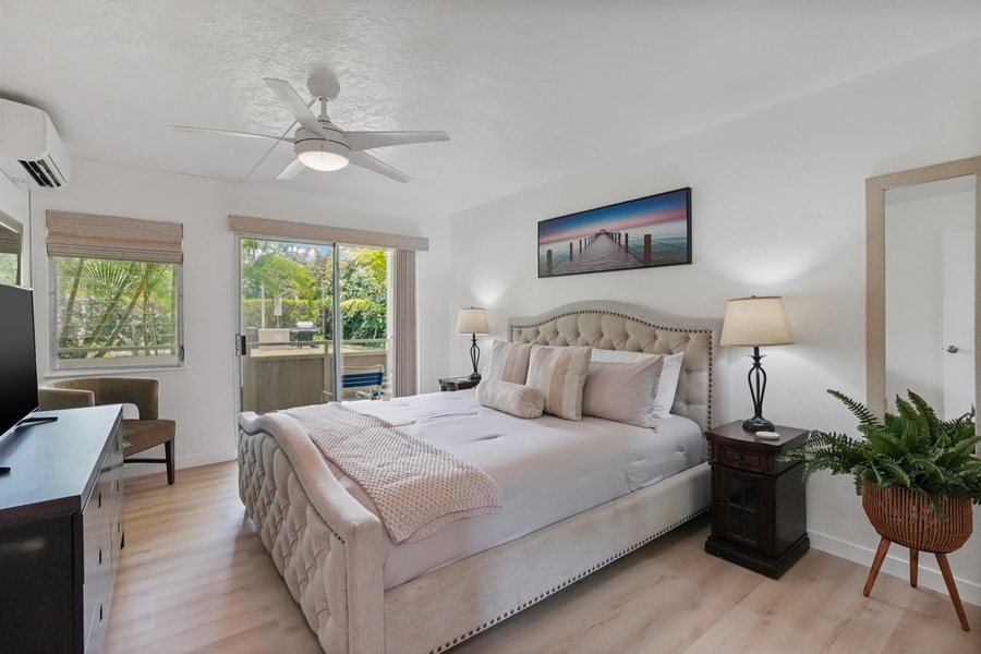 The bedroom has fan, split unit AC and sliding doors to private lanai.