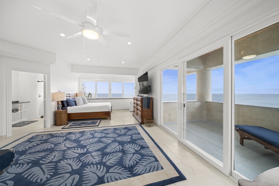 Primary Suite #1 w/king bed, ocean views, private deck, and two full en suite baths.