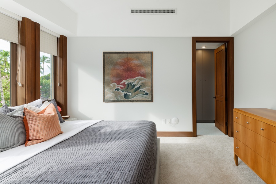 Bright and airy guest suite for a relaxing stay, complete with serene views of the outdoors.