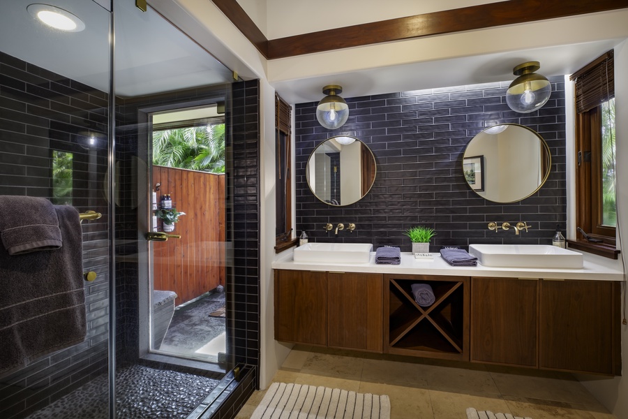Indulge in your sophisticated bathroom retreat with dual vanities, rainfall shower, and elegant design details that create the perfect spa-like experience.