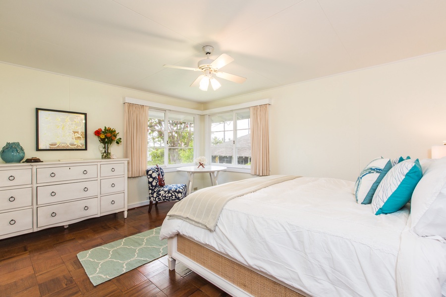 The primary bedroom features a king bed and a new split air conditioning system for added comfort.