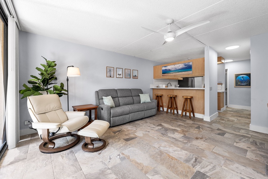 Spacious living room with large windows and abundant natural light.