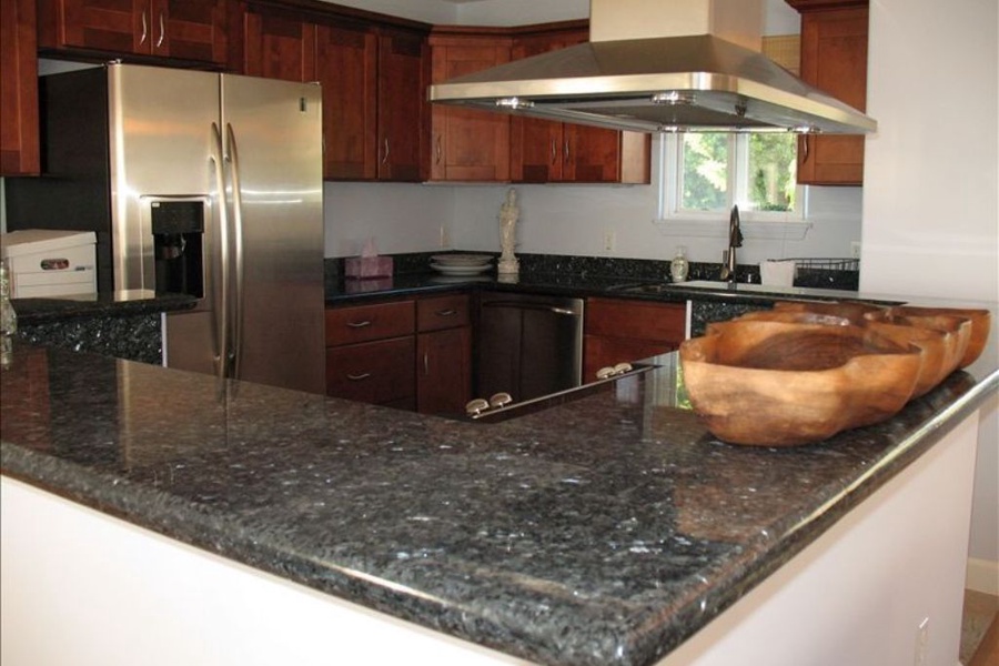 Newly remodeled kitchen with stainless steel appliances.