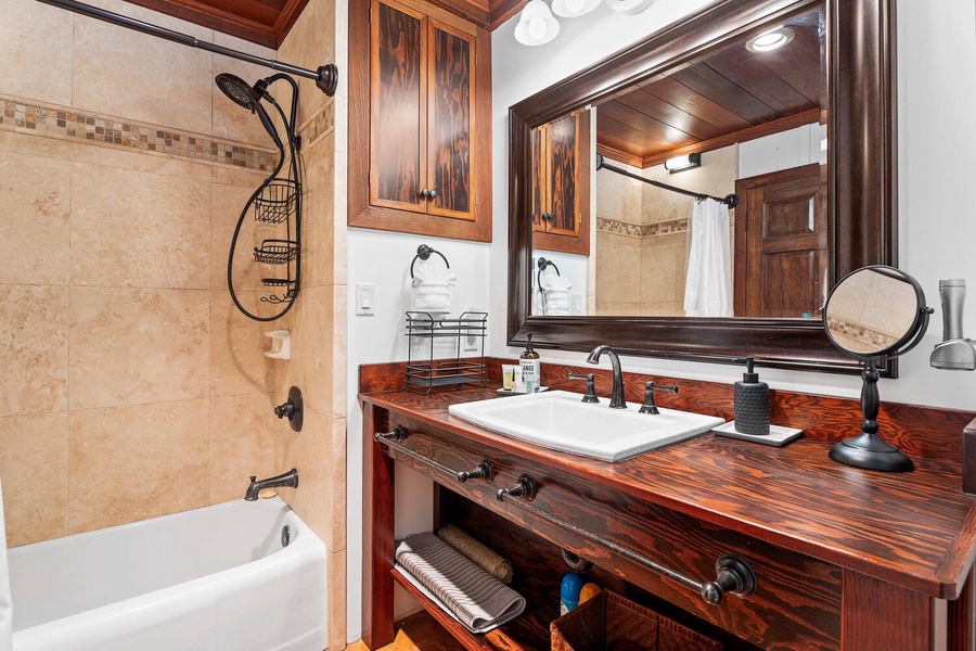Rustic charm meets modern comfort in this well-equipped primary bathroom.
