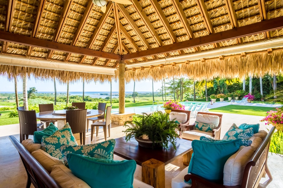 Relax in the open-air lounge with stunning garden and ocean views.