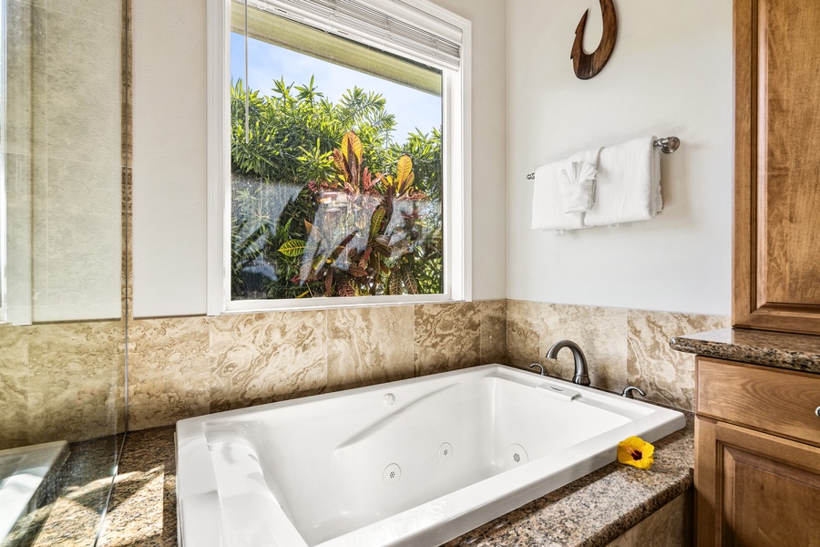 Large jetted soaking tub with a view