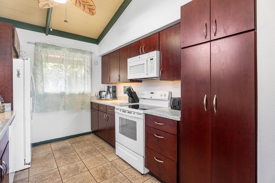 Well-equipped galley kitchen with full-size appliances and everything you need to prepare meals at home.