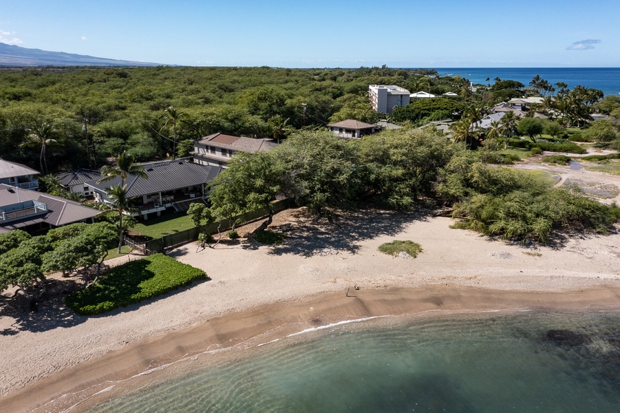 Bird eye view of the home, you can see how close to the beach it is