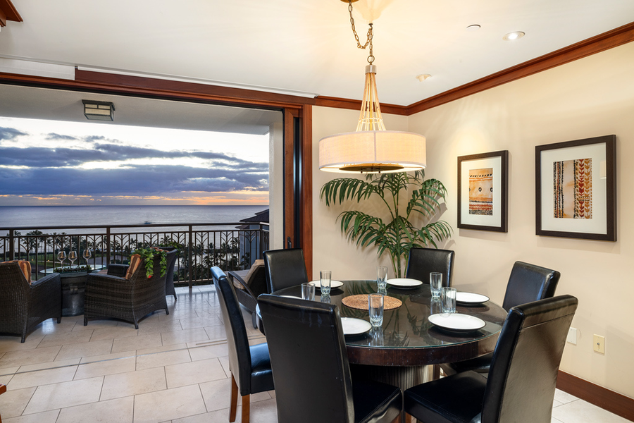The open concept design provides sunset views whether on the lanai or dining space.