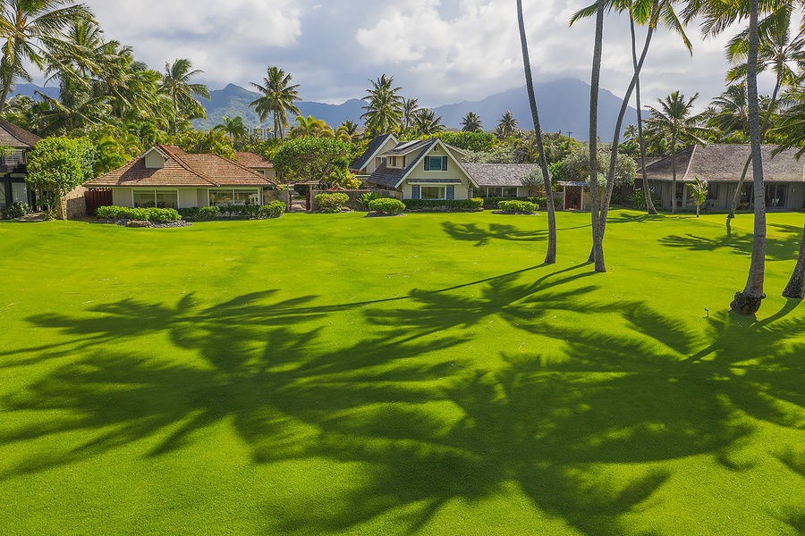 Open green spaces with meticulously maintained landscaping for relaxation or outdoor fun.