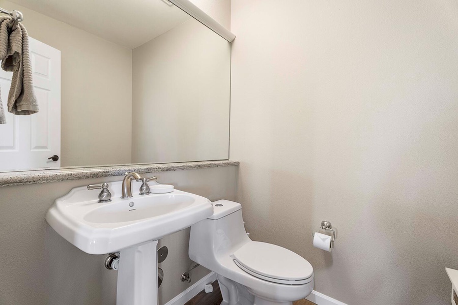 A convenient guest powder room. near the living room.