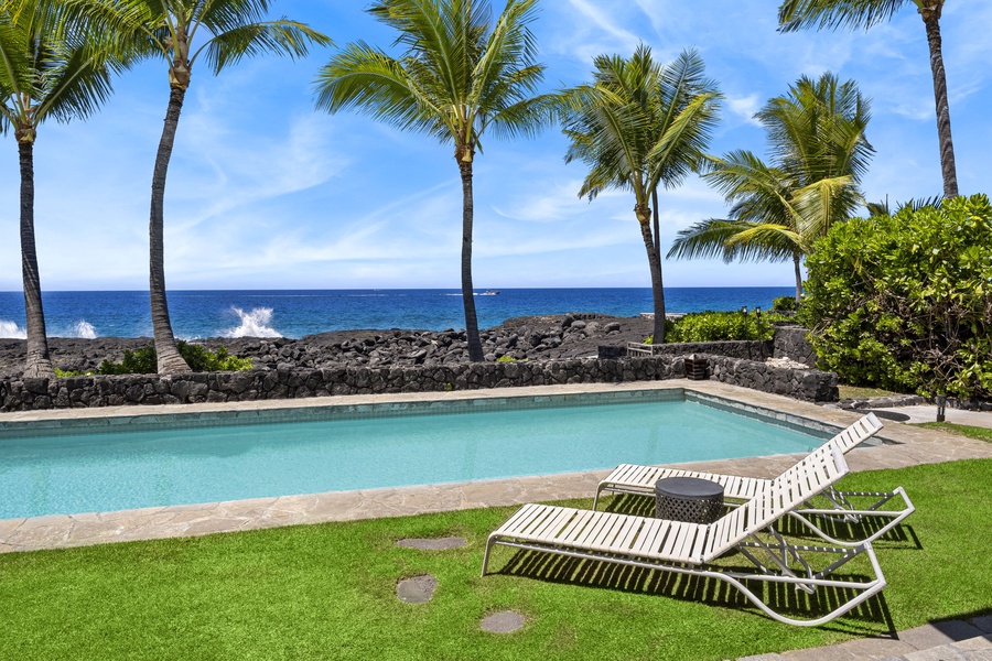 Lounge poolside in the Kona sun with ocean breezes all around.