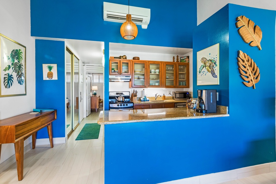 From the living room, Napili Shores F-252 offers a clear view into the spacious, modern kitchen