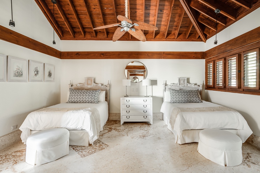 The fourth guest suite has two double beds, perfect for the kids.