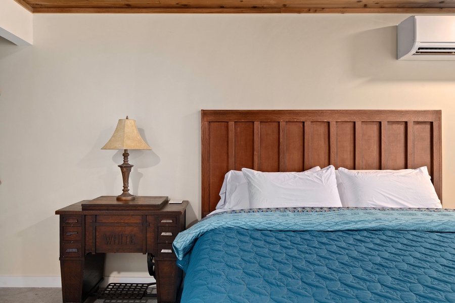 Soft linens and forest-inspired touches make this king bedroom a perfect place to unwind after a day of adventure.