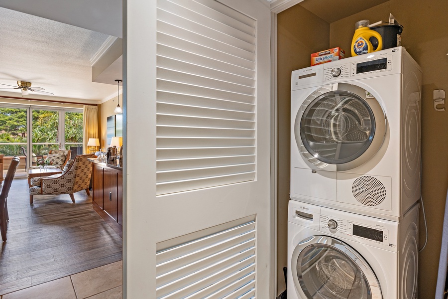 Full-size washer and dryer tucked inside the hallway closet in Honua Kai Konea 230/232 for your convenience