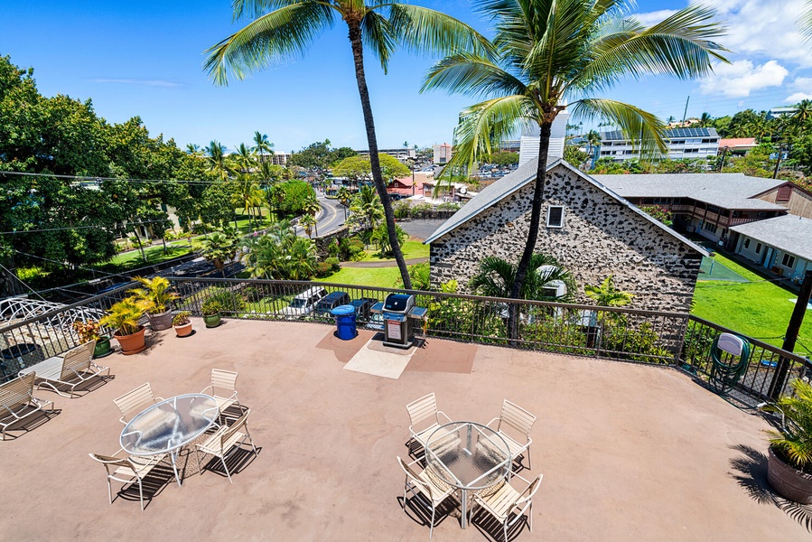 Surrounded by swaying palms and tropical views, perfect for your morning coffee or evening barbecue gathering.
