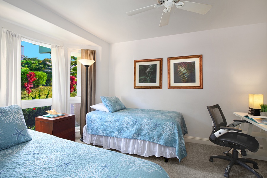 A third suite features twin beds and its own ensuite bathroom for added privacy.