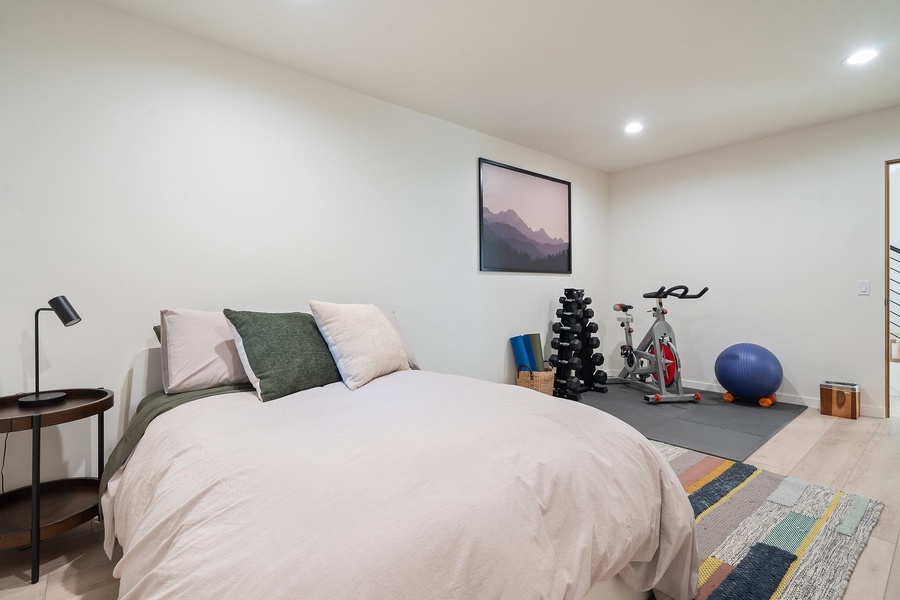 The guest bedroom four features a private home gym.