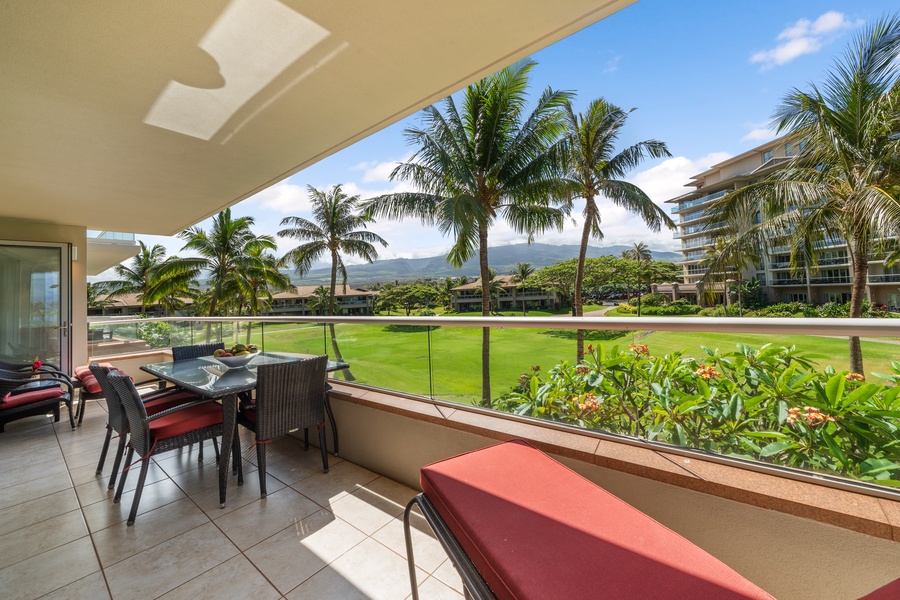 Enjoy uninterrupted views of palm trees and greens from your shaded outdoor perch at Honua Kai Konea 204.