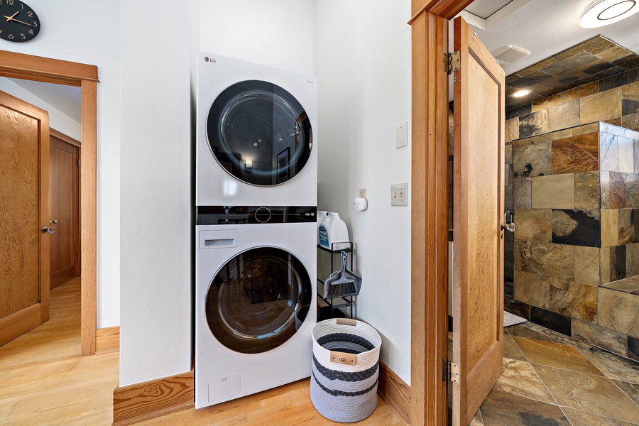 A provisioned laundry space with a washer and a dryer.