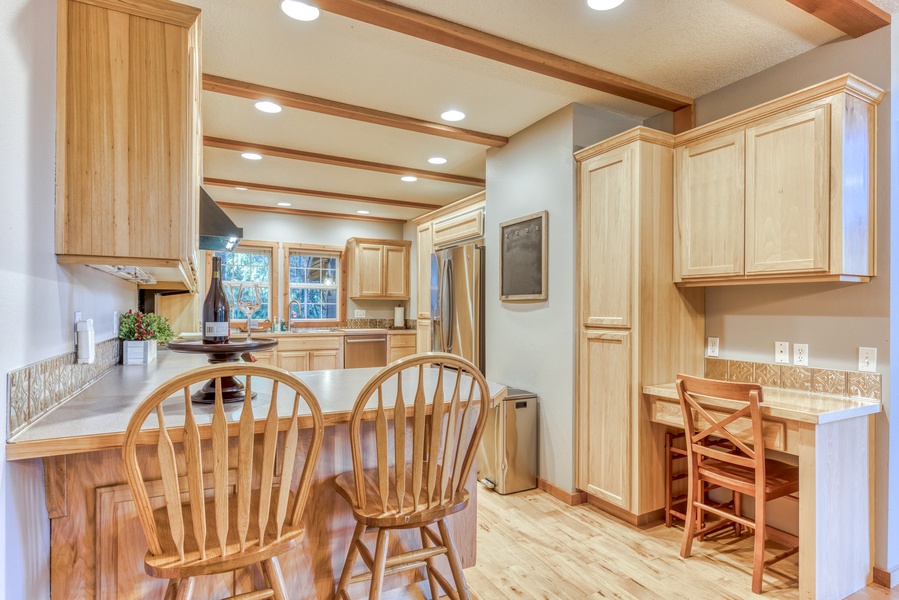 The kitchen counter area is perfect for quick meals or visiting with the chef.