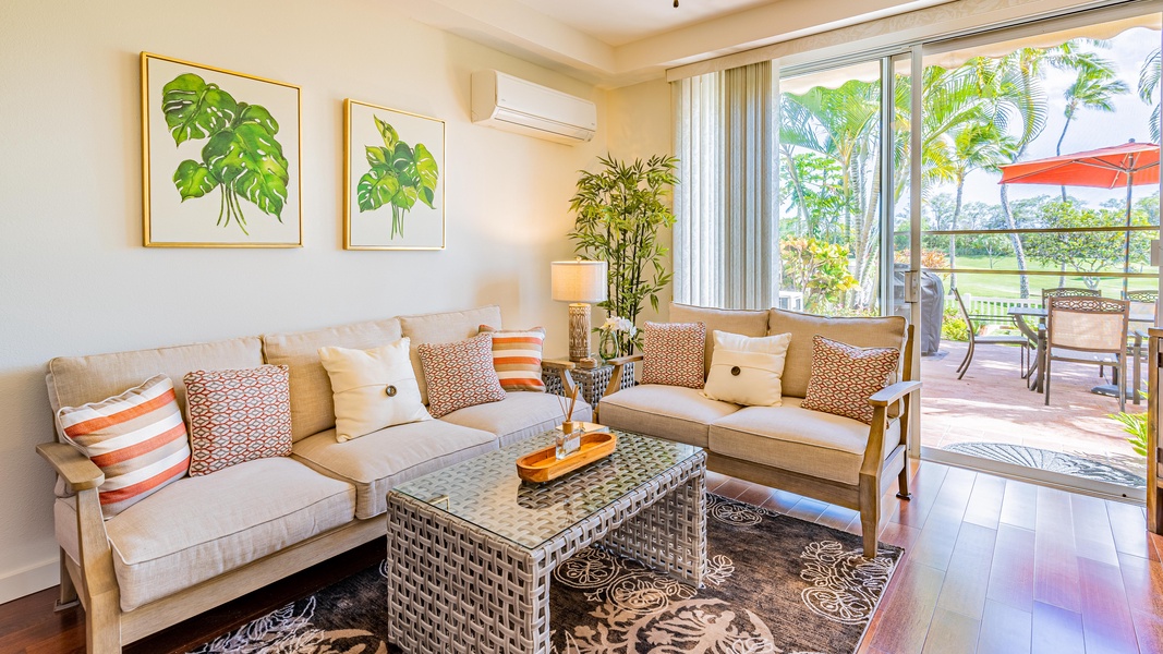 Sink into the plush seating in the living area surrounded by natural wood tones for your next movie night.