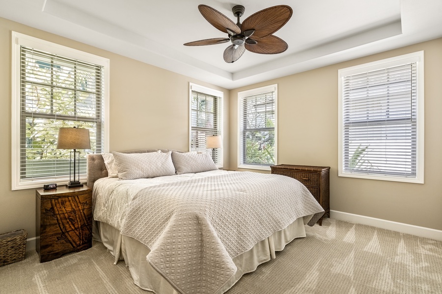 Guest bedroom equipped with King bed, A/C, and TV