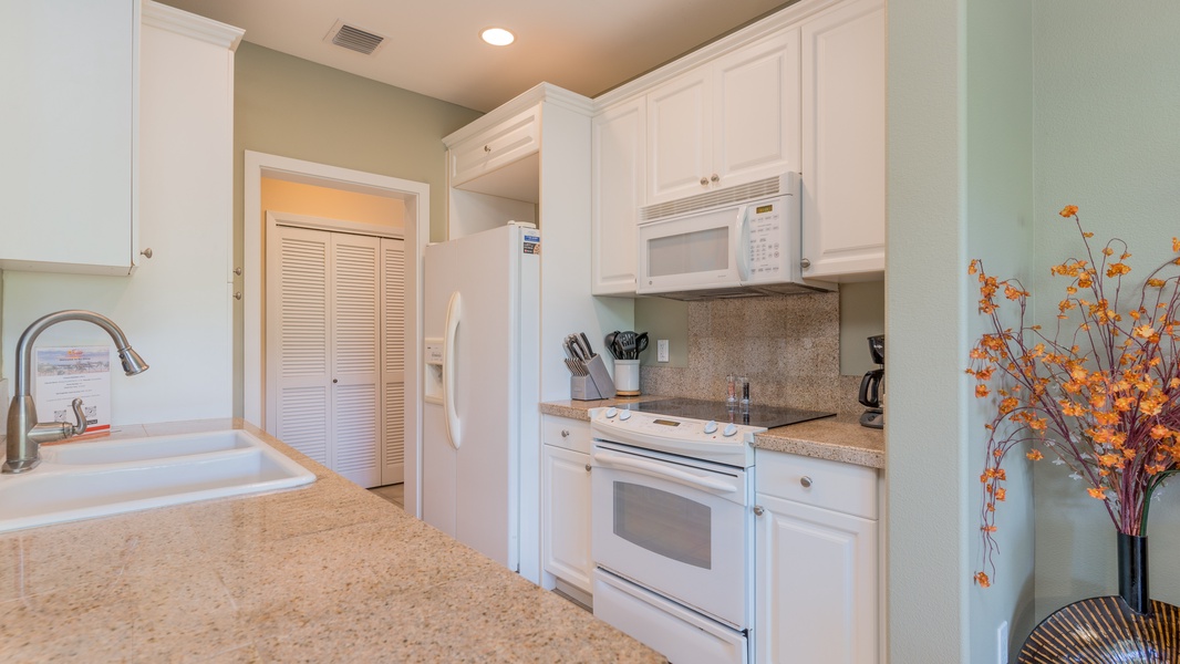 The kitchen is equipped with many amenities for your culinary adventures.
