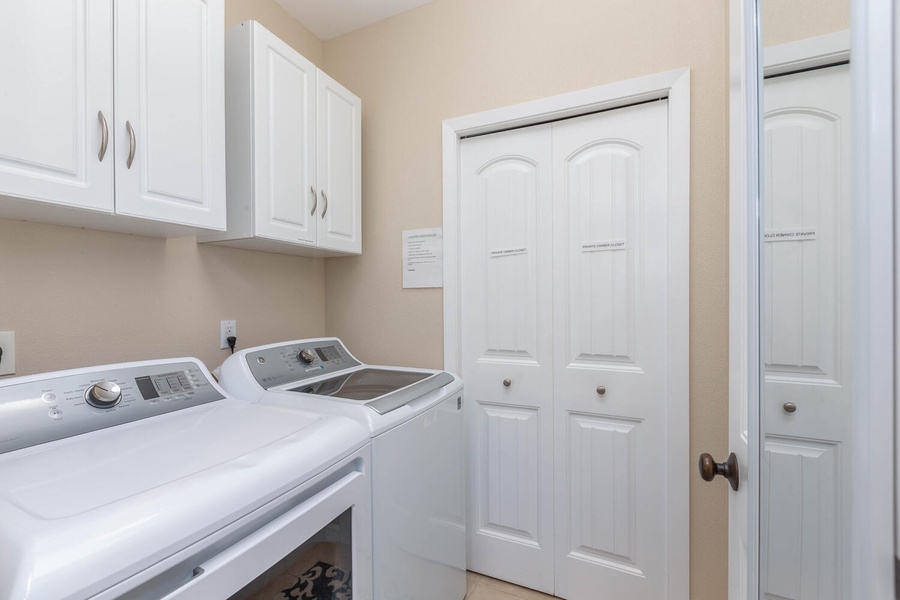 Laundry room with full washer and dryer