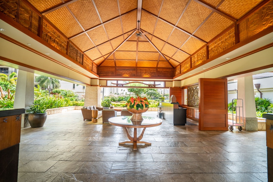 Step into this grand lobby with soaring bamboo ceilings and tropical elegance welcoming you to your island getaway.