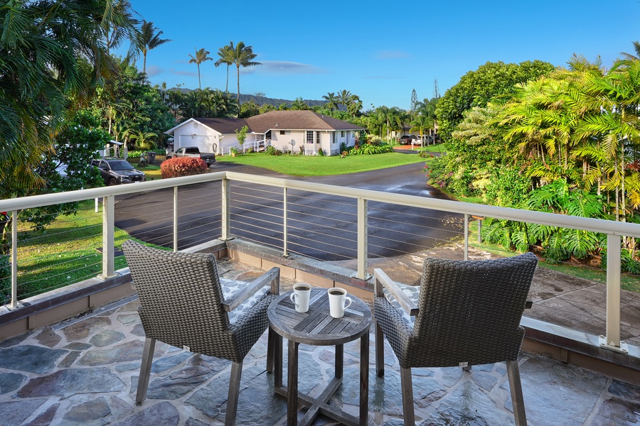 Sip your morning coffee on your private terrace overlooking tropical gardens and peaceful neighborhood views.