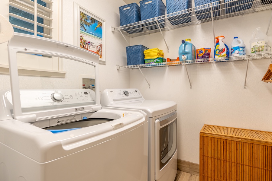 Laundry area with a washer/dyer for your convenience.