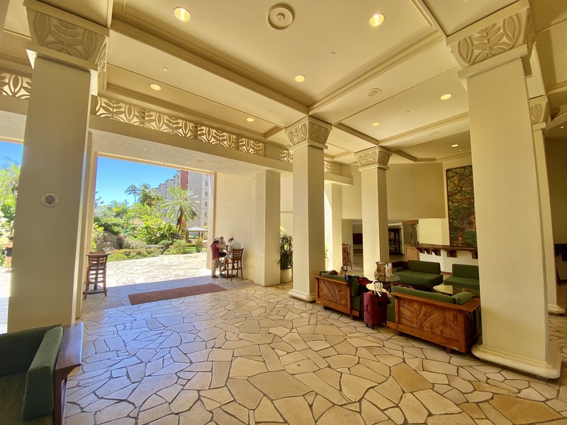 The resort's elegant lobby welcomes guests with spacious seating and tropical décor, setting the tone for a relaxing stay.